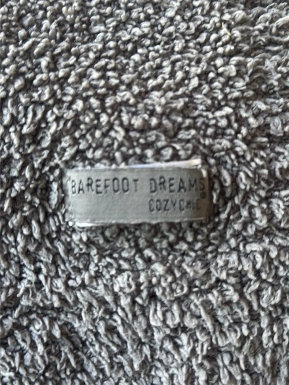 Barefoot Dreams cozy chic grey blanket with white trim